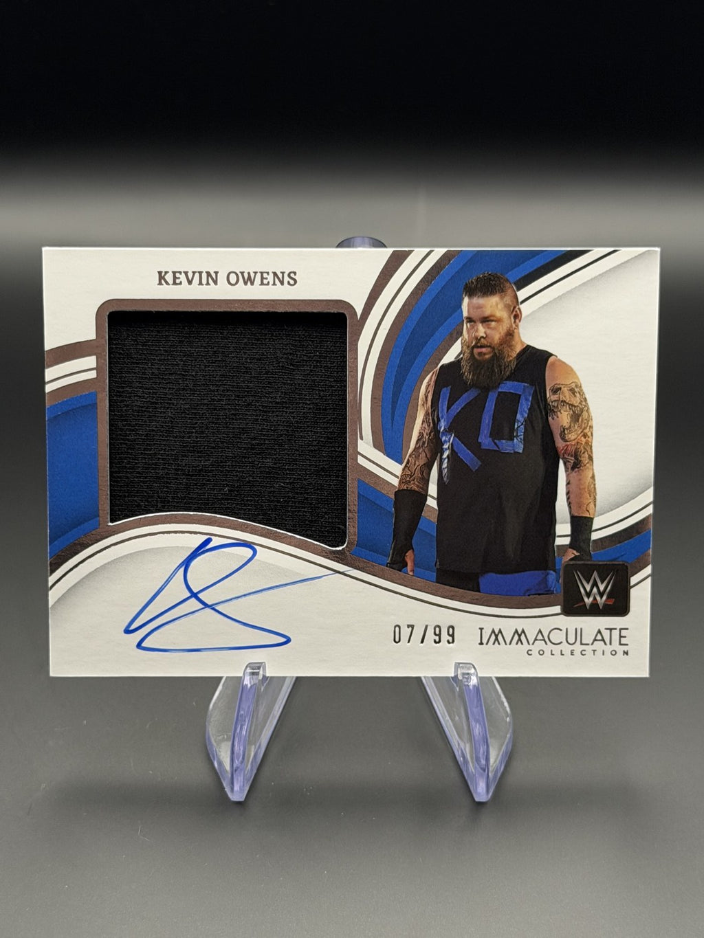 Kevin Owens 2023 Panini Immaculate WWE Premium Memorabilia Autograph Relic /99 front